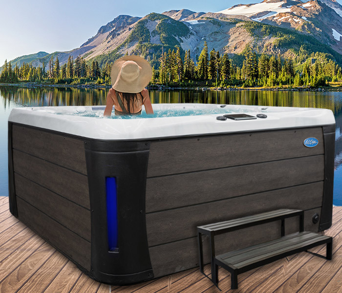 Calspas hot tub being used in a family setting - hot tubs spas for sale Good Year